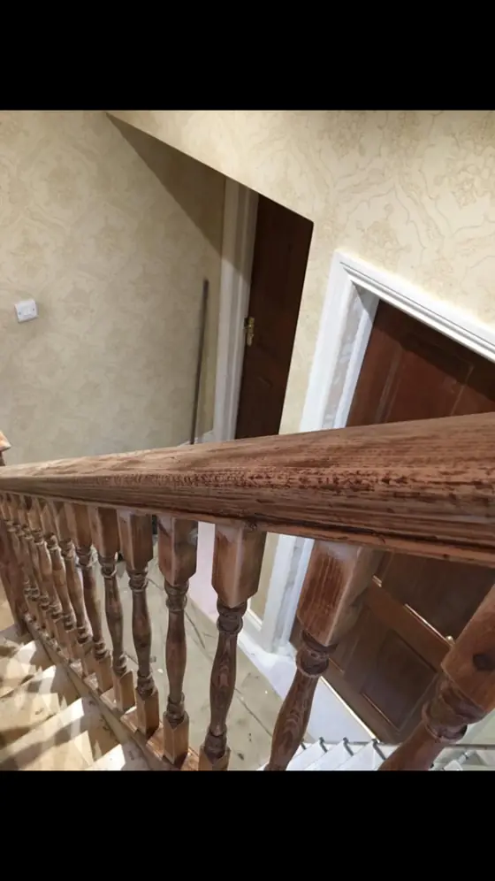 Crouch End period stairwell with restored white balusters, stained wooden treads and warm white walls additional project view 5