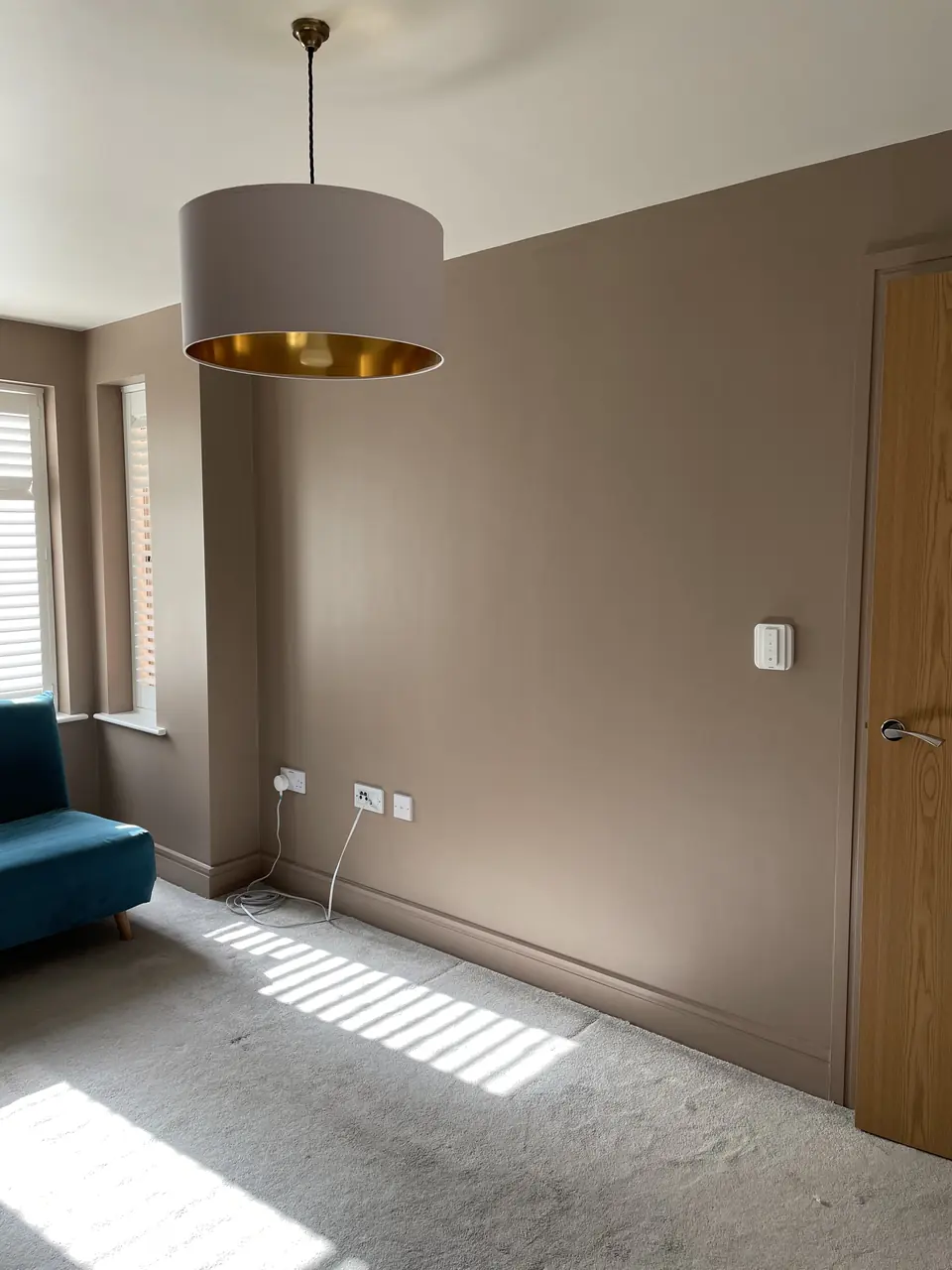 Finchley bedroom feature walls with deep paint colour, crisp geometry and hand-finished edges detail view