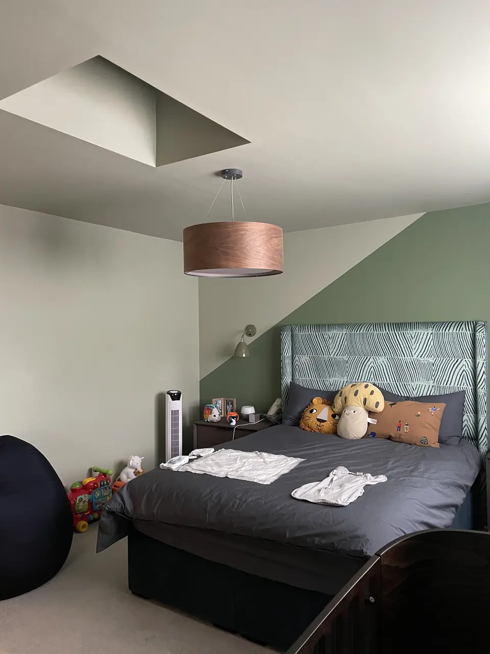 Finchley bedroom feature walls with deep paint colour, crisp geometry and hand-finished edges close detail