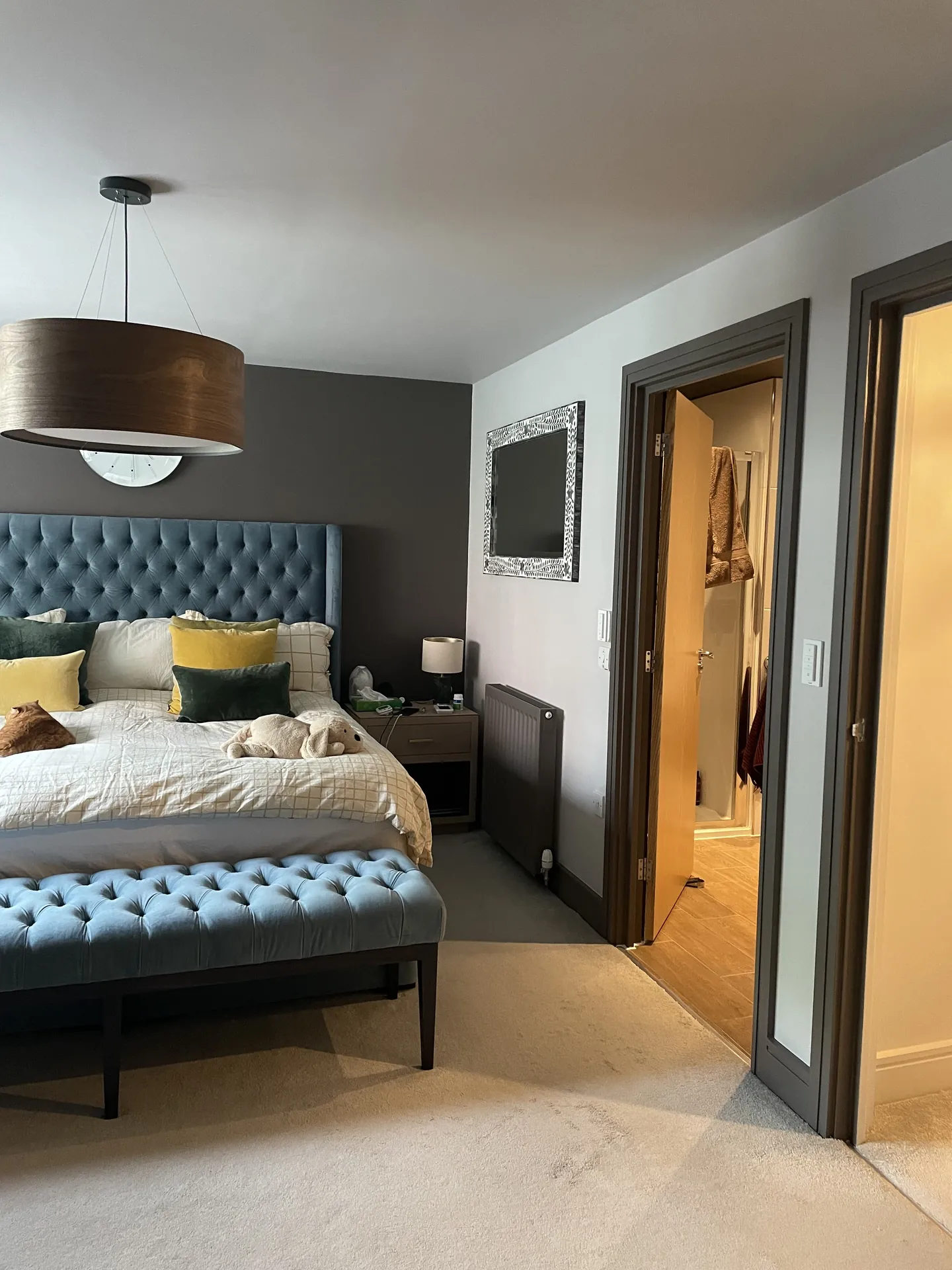 Finchley bedroom feature walls with deep paint colour, crisp geometry and hand-finished edges finished result