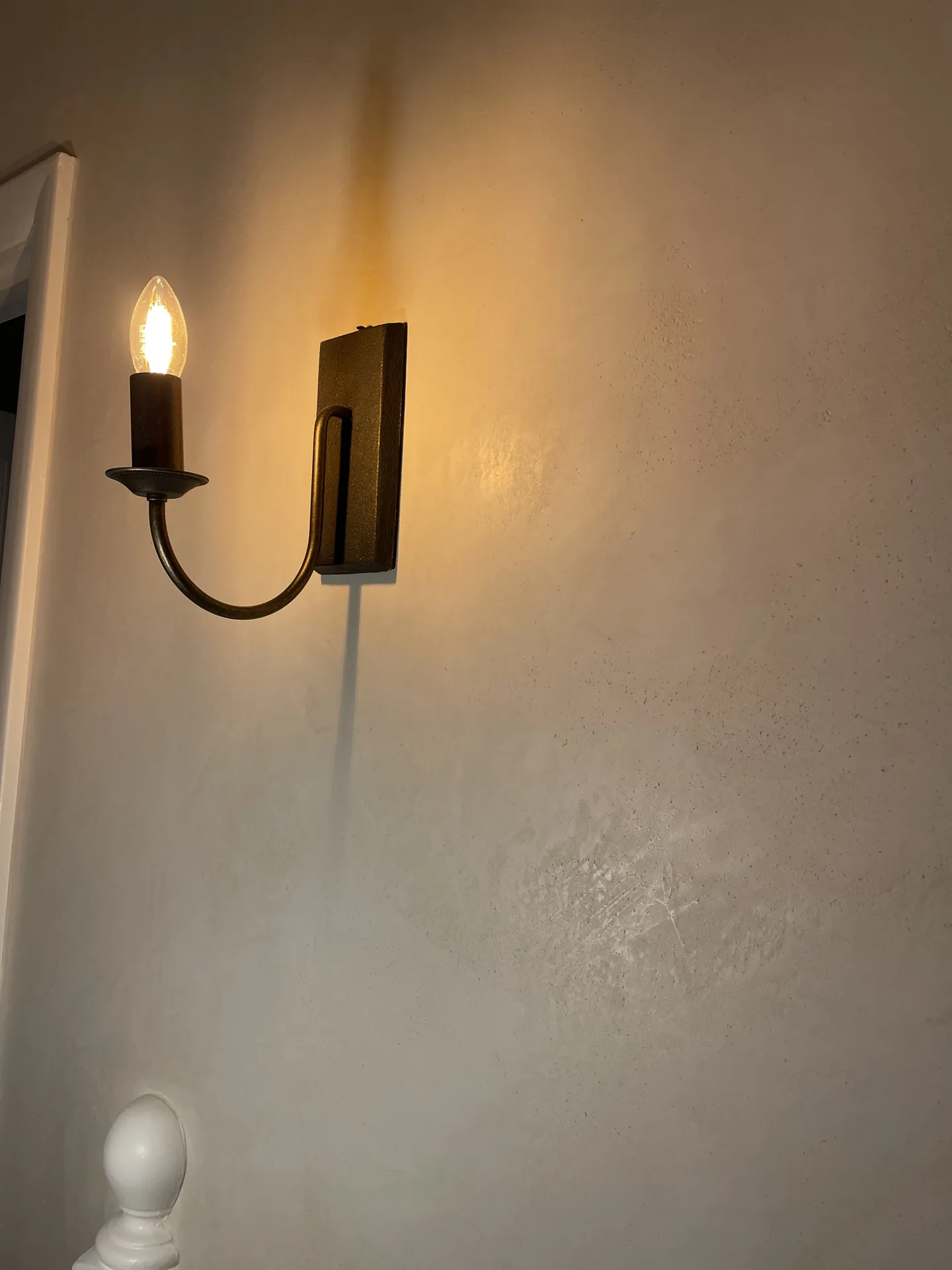 Hampstead interior with warm Venetian plaster carried through connected living spaces finished room view
