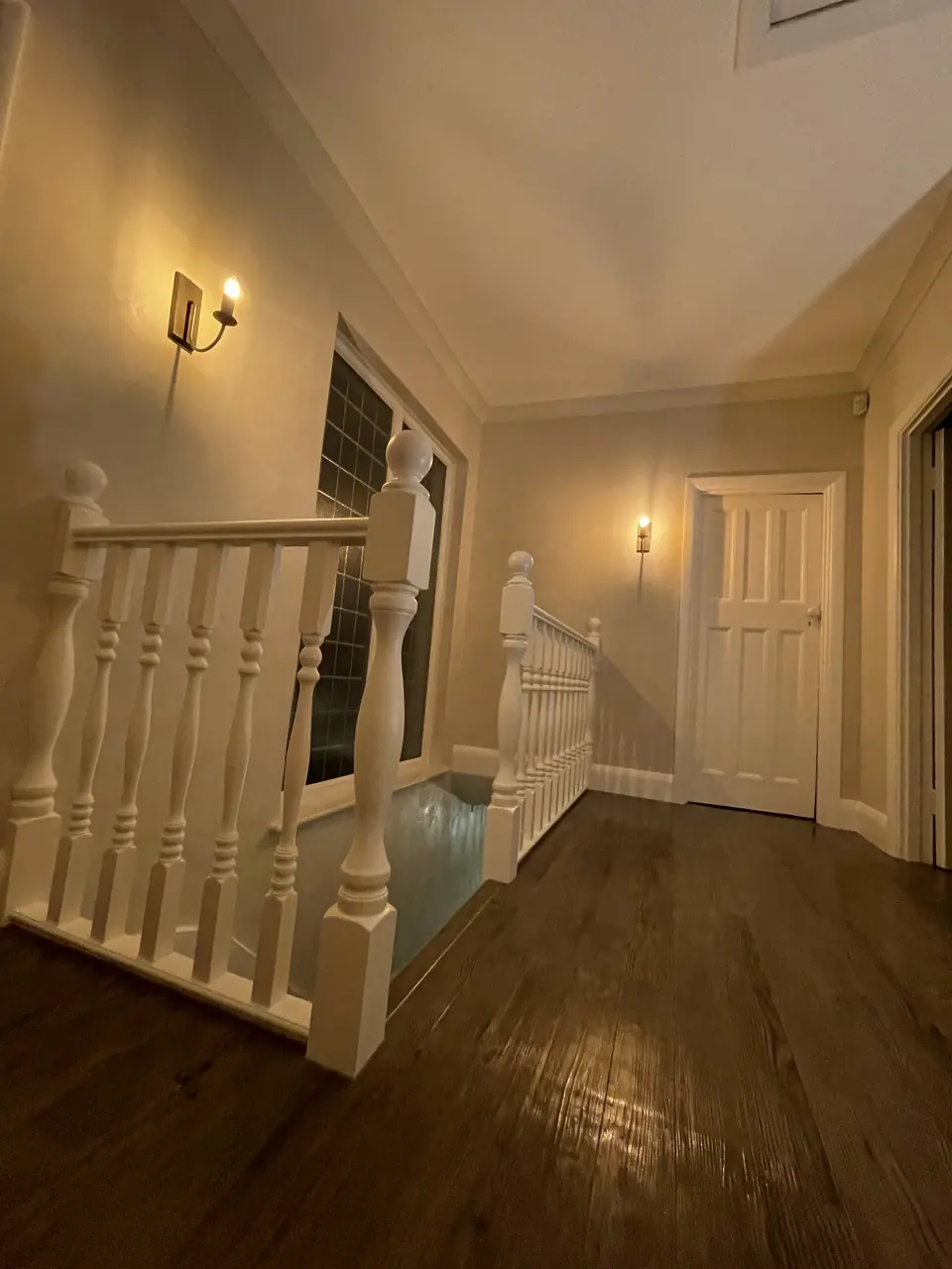 Hampstead interior with warm Venetian plaster carried through connected living spaces in-progress view