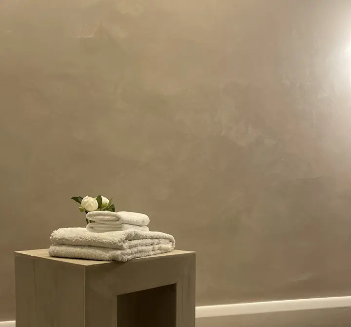 Warm Venetian plaster finish across a Hampstead interior wall
