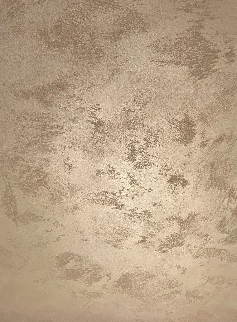 Textured specialist wall finish with subtle movement and light-catching surface